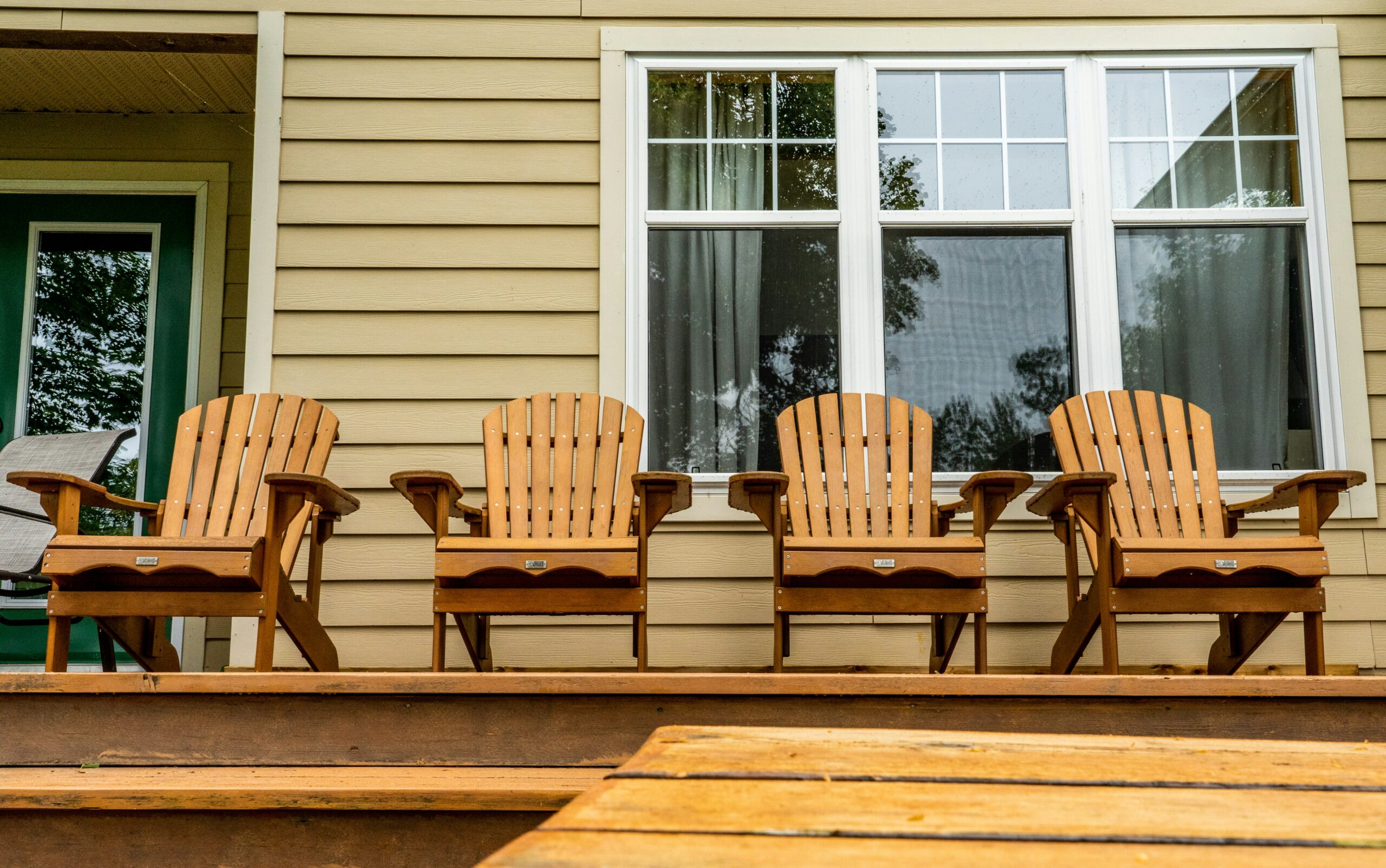 Outdoor wood deck with dock chairs