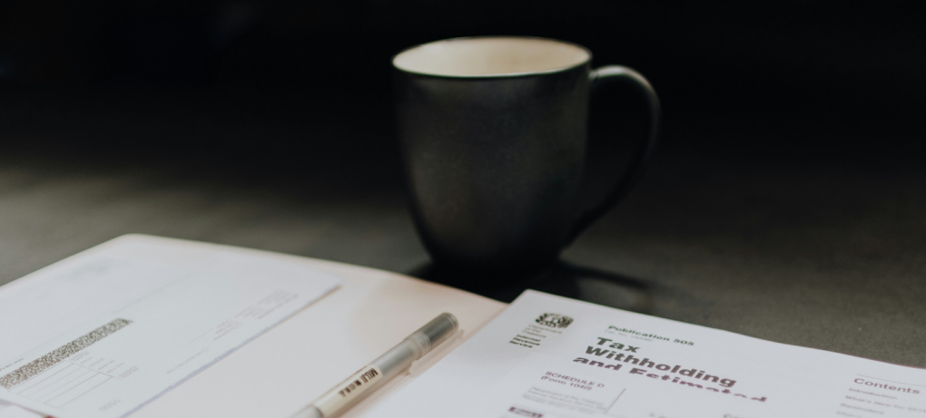 tax planning with tax forms over coffee
