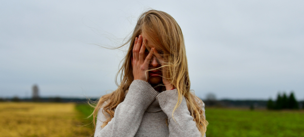 Image of a woman overwhelmed by life.